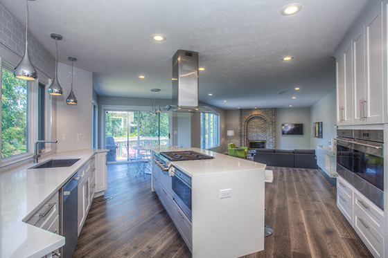 home kitchen with an island and white countertops